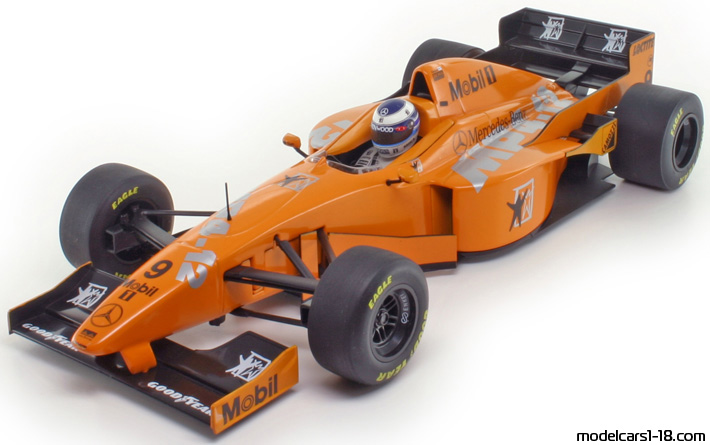 1997 - McLaren Mercedes MP4-12 Minichamps 1/18 (Оранжев / Черен) Предна лява страна