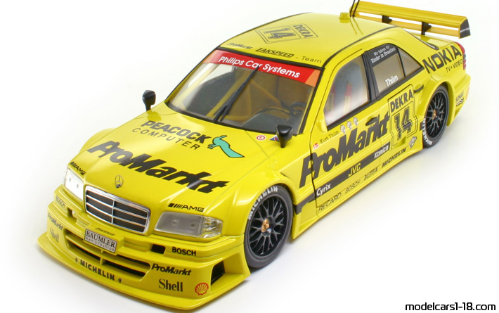 1994 - Mercedes C 180 DTM (W202) UT 1/18 (Gelb / Schwarz) Vorne linke Seite