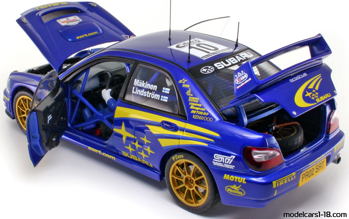 2002 - Subaru Impreza AutoArt 1/18 (Blau / Gelb) Zu öffnende Teile