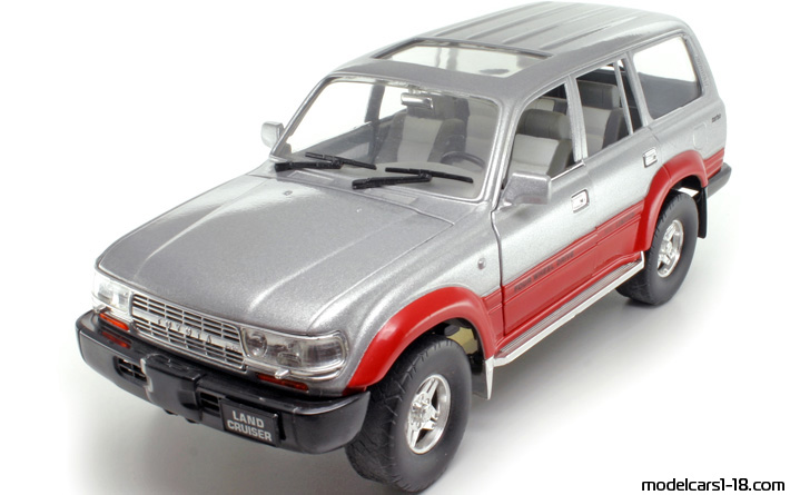1992 - Toyota Land Cruiser FJ 80G Road Tough 1/18 (Silber / Rot) Vorne linke Seite