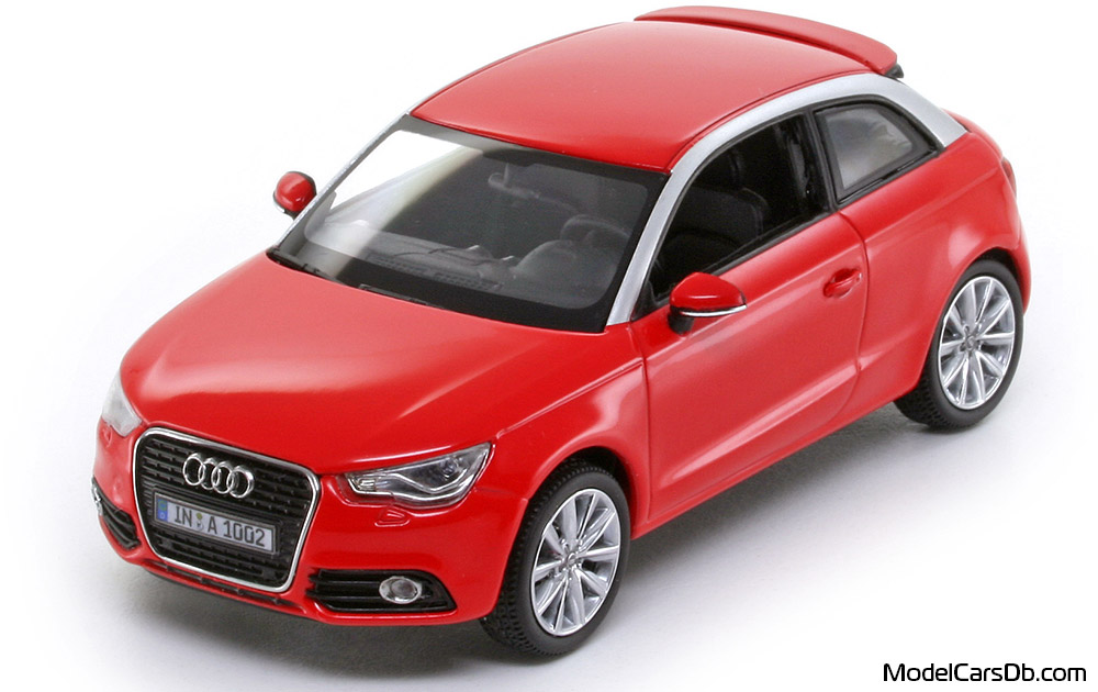 2010 - Audi A1 (8X) Kyosho 1/43 (Rot / Silber) Vorne linke Seite
