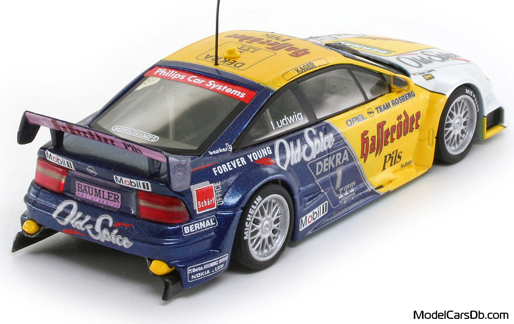 1995 - Opel Calibra V6 Minichamps 1/43 (Yellow / Blue) Rear right side