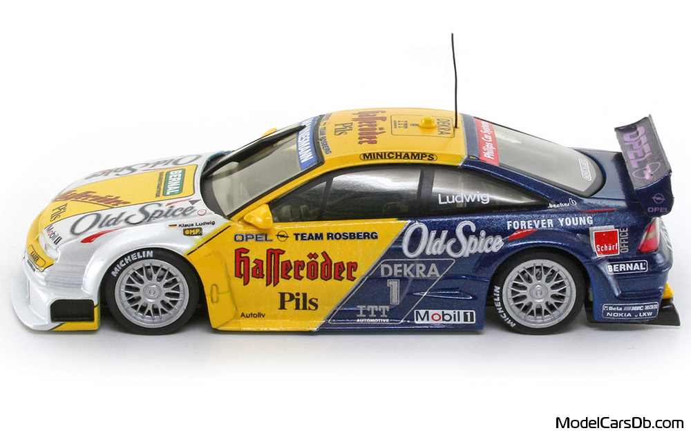 1995 - Opel Calibra V6 Minichamps 1/43 (Yellow / Blue) Side