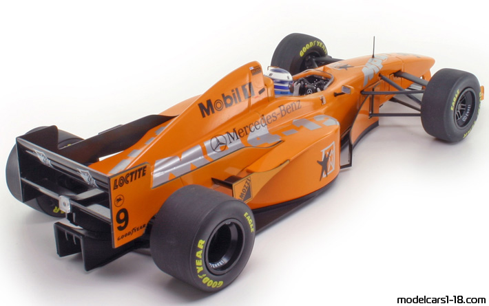 1997 - McLaren Mercedes MP4-12 Minichamps 1/18 (Оранжевый / Чёрный) Задняя правая сторона