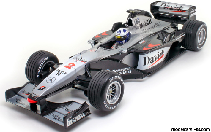 2000 - McLaren Mercedes MP4-15 Minichamps 1/18 (Светло-серебристый / Чёрный) Передняя левая сторона