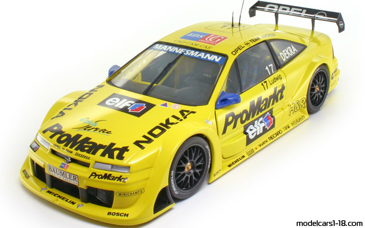 1996 - Opel Calibra V6 DTM UT 1/18 (Жёлтый / Чёрный) Передняя левая сторона