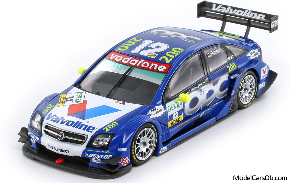 2005 - Opel Vectra GTS V8 DTM Minichamps 1/43 (Синий / Белый) Передняя левая сторона