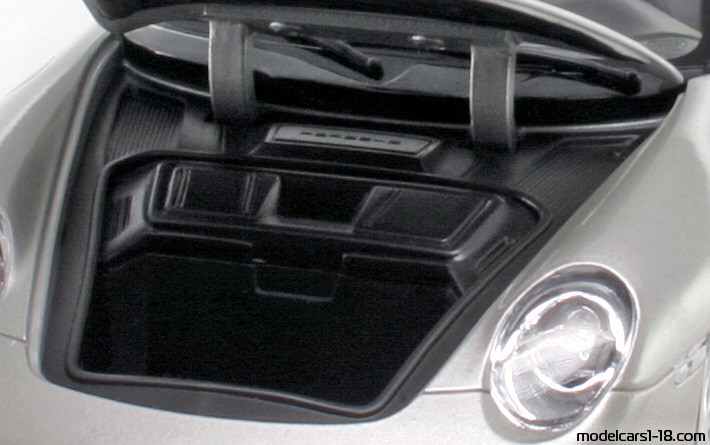 2006 - Porsche 911 Carrera 4S Cabriolet (997) Norev 1/18 (Серебристый) Багажник / Поднимающиеся фары