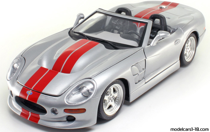 1999 - Shelby Series 1 Bburago 1/18 (Серебристый / Kрасный) Передняя левая сторона