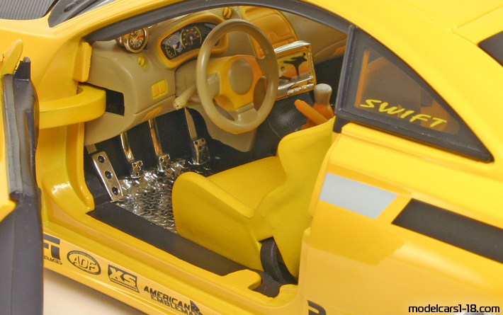 1999 - Toyota Celica (T230) Jada Toys 1/18 (Жёлтый / Чёрный) Интерьер панель приборов